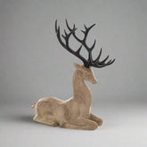 Natúr színű, karácsonyi szarvas figura.